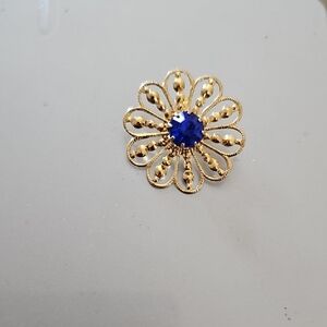 Gold Floral Brooch with Sapphire Blue Accent
